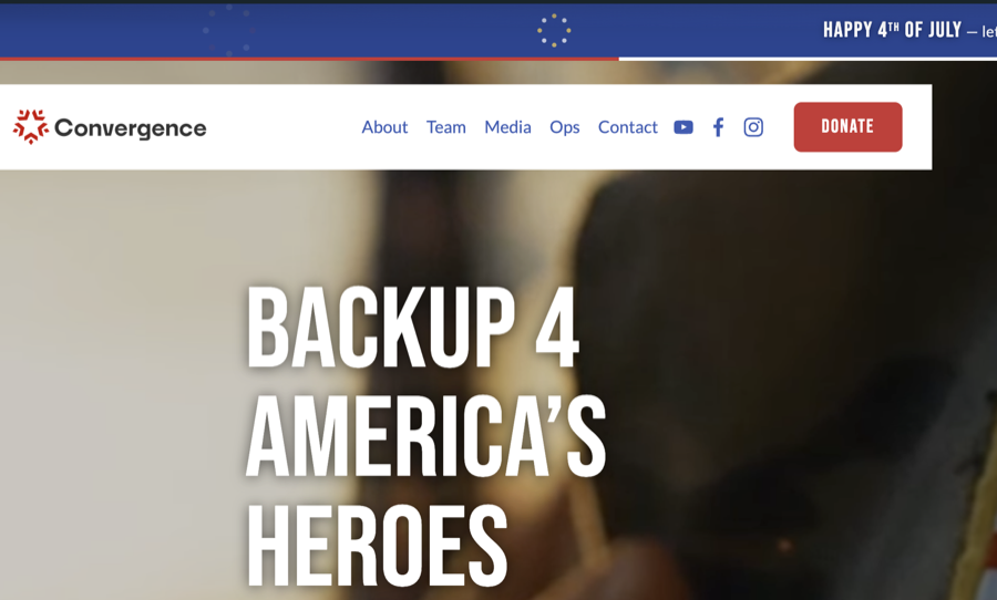 The same homepage after the edit, with a Happy Fourth of July banner across the top.